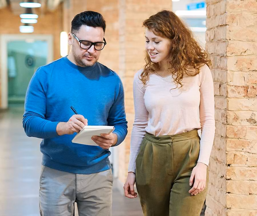 Two People Walking and Talking